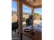 Outdoor kitchen featuring a table with food, a smoker, and an outdoor dining space at 3212 E Constance Way, Phoenix, AZ 85042