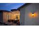 Patio featuring string lights, fire pit, and desert plants at 3212 E Constance Way, Phoenix, AZ 85042