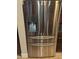 Stainless steel Samsung refrigerator with water dispenser and freezer drawers, perfect for modern kitchens at 3212 E Constance Way, Phoenix, AZ 85042