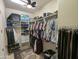 Walk-in closet with shelves and hanging rods at 3212 E Constance Way, Phoenix, AZ 85042