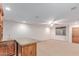 Living room features wet bar and a lot of light from the window and ceiling lights at 3464 E Dartmouth St, Mesa, AZ 85213