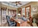 Office with coffered ceilings, wooden desk, and glass french doors at 3464 E Dartmouth St, Mesa, AZ 85213