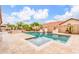 An inviting pool is nestled in a well-maintained backyard, offering a tranquil oasis for relaxation and recreation at 3464 E Dartmouth St, Mesa, AZ 85213