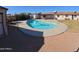 Spacious backyard with a refreshing pool and ample outdoor space for entertainment at 350 N 9Th St, Coolidge, AZ 85128