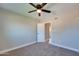 Bedroom with neutral walls, ceiling fan, and carpet at 350 N 9Th St, Coolidge, AZ 85128