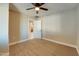 Bedroom with neutral walls, ceiling fan, and tan carpet at 350 N 9Th St, Coolidge, AZ 85128