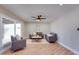 Comfortable living room with neutral walls, wood floors, and a ceiling fan at 350 N 9Th St, Coolidge, AZ 85128