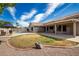 Inviting backyard with a refreshing pool, covered patio, and well-maintained landscaping at 3602 W Barcelona Dr, Chandler, AZ 85226