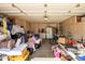 Organized garage space with storage cabinets, shelves, and ample room for parking and projects at 3602 W Barcelona Dr, Chandler, AZ 85226