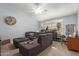 Cozy living room showcasing a comfortable sectional sofa and a ceiling fan for added comfort at 3602 W Barcelona Dr, Chandler, AZ 85226