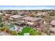 Aerial view of a home with a swimming pool, covered patio, and landscaped backyard at 4297 S Marion Pl, Chandler, AZ 85249