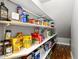 Walk-in pantry offers ample shelving space for storage and organization at 4297 S Marion Pl, Chandler, AZ 85249