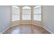 Dining area with bay windows, tile flooring, and natural light at 5125 W Wikieup Ln, Glendale, AZ 85308