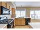 Well-equipped kitchen with modern appliances and ample counter space at 5125 W Wikieup Ln, Glendale, AZ 85308