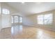 Bright living room featuring vaulted ceilings, tile flooring, and recessed lighting at 5125 W Wikieup Ln, Glendale, AZ 85308