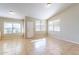 Bright living room with tile flooring, neutral walls, and large windows for natural light at 5125 W Wikieup Ln, Glendale, AZ 85308