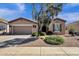 Charming single-story home with desert landscaping, a two-car garage, and a cozy, inviting curb appeal at 5165 S Peach Willow Ln, Gilbert, AZ 85298