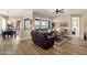 Comfortable living room area showcasing wood-look floors and an open layout at 5165 S Peach Willow Ln, Gilbert, AZ 85298