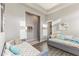 Bedroom with two daybeds, hardwood floors and a glimpse of the hallway and bathroom, creating a harmonious flow at 5421 E Juniper Canyon Dr, Cave Creek, AZ 85331