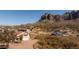 Stunning desert home with mountain views showcasing the surrounding neighborhood and desert landscaping at 5556 E Singletree St, Apache Junction, AZ 85119