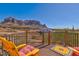 Outdoor deck area with seating and stunning views of the surrounding desert landscape at 5556 E Singletree St, Apache Junction, AZ 85119