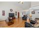 Inviting living room featuring hard wood floors, neutral color scheme, and ample natural light at 5556 E Singletree St, Apache Junction, AZ 85119