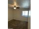 Bedroom with carpet, ceiling fan, and window for great lighting at 5995 N 78Th St # 2026, Scottsdale, AZ 85250