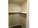 Brightly lit closet with rod for hanging clothes and shelves for storage at 5995 N 78Th St # 2026, Scottsdale, AZ 85250