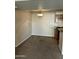 Dining room featuring a chandelier, carpet, and access to the kitchen at 5995 N 78Th St # 2026, Scottsdale, AZ 85250