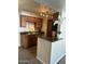 Kitchen featuring stainless steel faucet, dark countertops, and a white decorative plant at 5995 N 78Th St # 2026, Scottsdale, AZ 85250