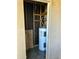 Utility closet containing water heater and storage space at 5995 N 78Th St # 2026, Scottsdale, AZ 85250