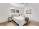 Inviting bedroom featuring light-filled window, soft decor, and a cozy bed, perfect for relaxation at 6012 E Vernon Ave, Scottsdale, AZ 85257