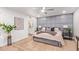 This main bedroom features elegant wall accents, stylish lamps, and a comfy bed, creating a relaxing retreat at 6012 E Vernon Ave, Scottsdale, AZ 85257