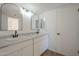 Well-lit bathroom features dual sinks with marble countertops and plenty of storage space beneath at 6841 W Yucca St, Peoria, AZ 85345