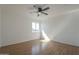 Simple bedroom with laminate floors, a ceiling fan, and a sunlit window for a cozy feel at 6841 W Yucca St, Peoria, AZ 85345