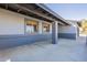 A view of the side exterior showcasing the brick wainscotting and window details at 6841 W Yucca St, Peoria, AZ 85345