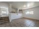 Bright living room features neutral paint, tile floors, and an open concept design at 6841 W Yucca St, Peoria, AZ 85345