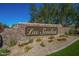 The Las Sendas community entrance provides an attractive approach to the neighborhood at 7703 E Sayan St, Mesa, AZ 85207