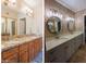 Dual vanity bathroom featuring updated countertops, modern lighting, and ample cabinet storage at 9196 E Evans Dr, Scottsdale, AZ 85260