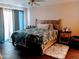 Inviting bedroom featuring a ceiling fan, neutral tones, and access to natural light at 9196 E Evans Dr, Scottsdale, AZ 85260