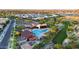 Aerial shot of community pool and recreation center with surrounding neighborhood at 9831 S 11Th St, Phoenix, AZ 85042