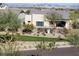 Modern home featuring desert landscaping and mature trees at 9831 S 11Th St, Phoenix, AZ 85042