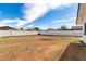 Spacious backyard with dirt yard and tall perimeter wall for enhanced privacy at 113 N Ridge Cir, Mesa, AZ 85203