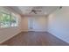 Neutral bedroom with updated flooring, bright window and neutral decor at 14006 N Tumblebrook Way, Sun City, AZ 85351