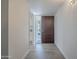 Welcoming entryway with tile flooring and clear view to updated kitchen at 14006 N Tumblebrook Way, Sun City, AZ 85351