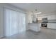 Bright eat-in kitchen featuring granite countertops, stainless steel appliances, and tile flooring at 14006 N Tumblebrook Way, Sun City, AZ 85351