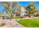 Beautiful apartment building with lush lawn and desert landscaping at 14950 W Mountain View Blvd # 4103, Surprise, AZ 85374