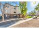 Attractive apartment building with desert landscaping and mature trees at 14950 W Mountain View Blvd # 4103, Surprise, AZ 85374