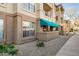 Charming apartment with a stylish awning and well-maintained landscaping at 14950 W Mountain View Blvd # 4103, Surprise, AZ 85374