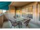 Inviting covered patio with a comfortable seating area at 14950 W Mountain View Blvd # 4103, Surprise, AZ 85374